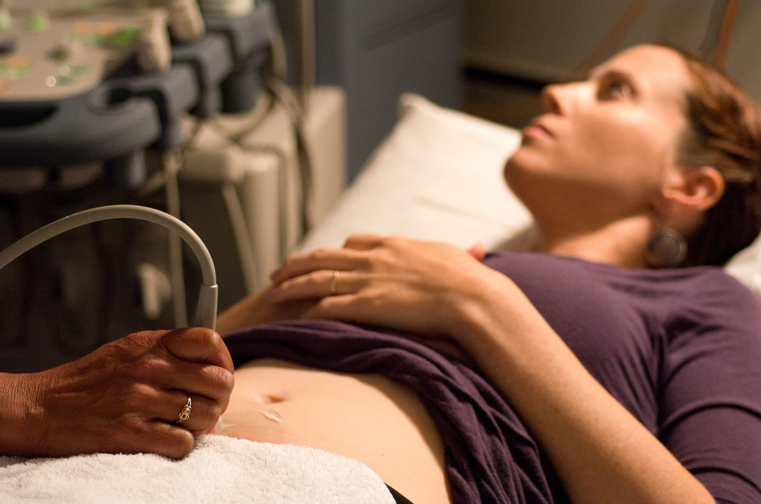 Woman having abdominal ultrasound scan